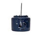Navy blue nautical lantern, These lanterns are uniquely designed with nautical shaped cut outs that allow light from the candles to shine through.  Each lantern has a wire insert that holds the candle in the middle of the lantern and metal handle for hanging 