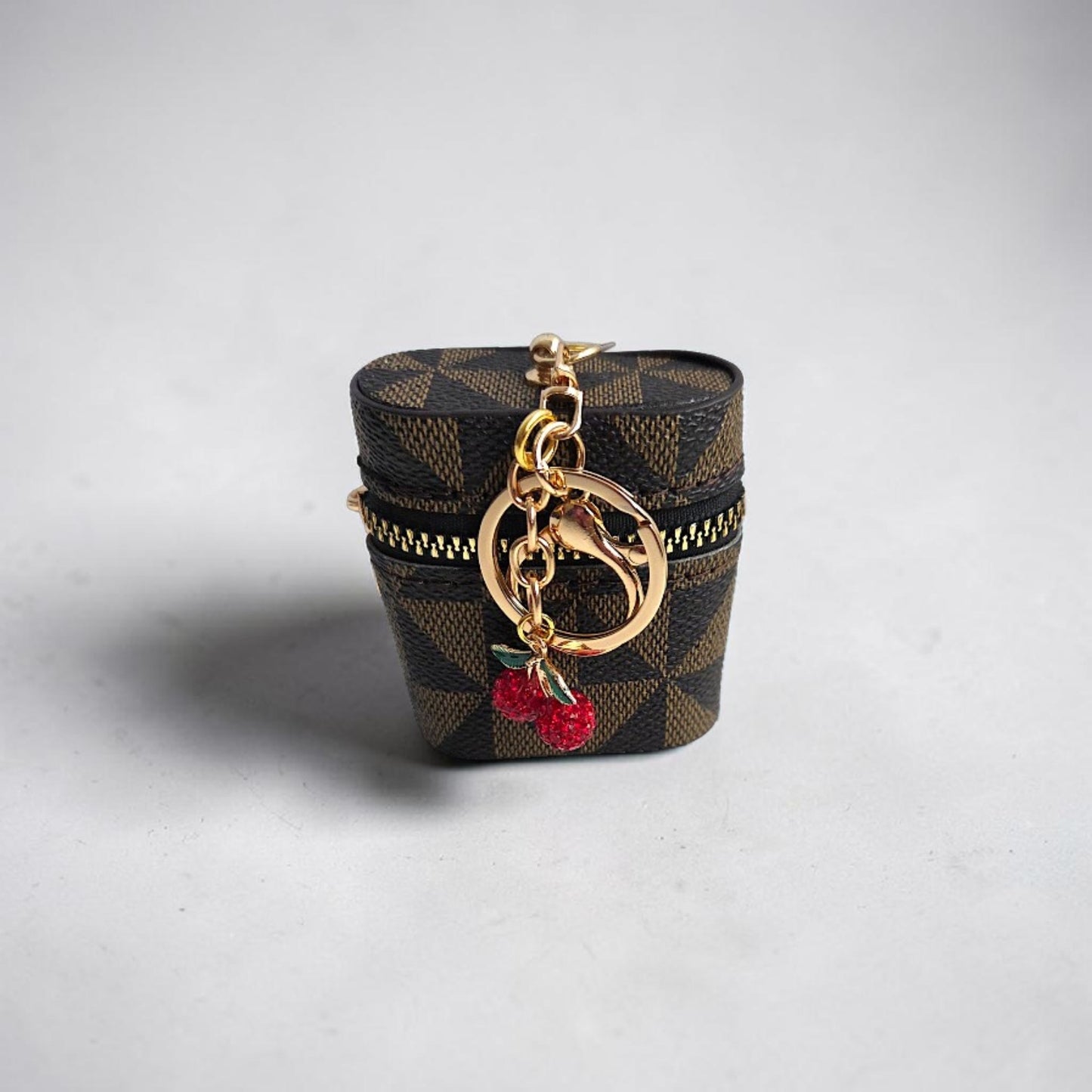 Faux Leather Geometric Pattern Earbud Holder Keychain with Charms