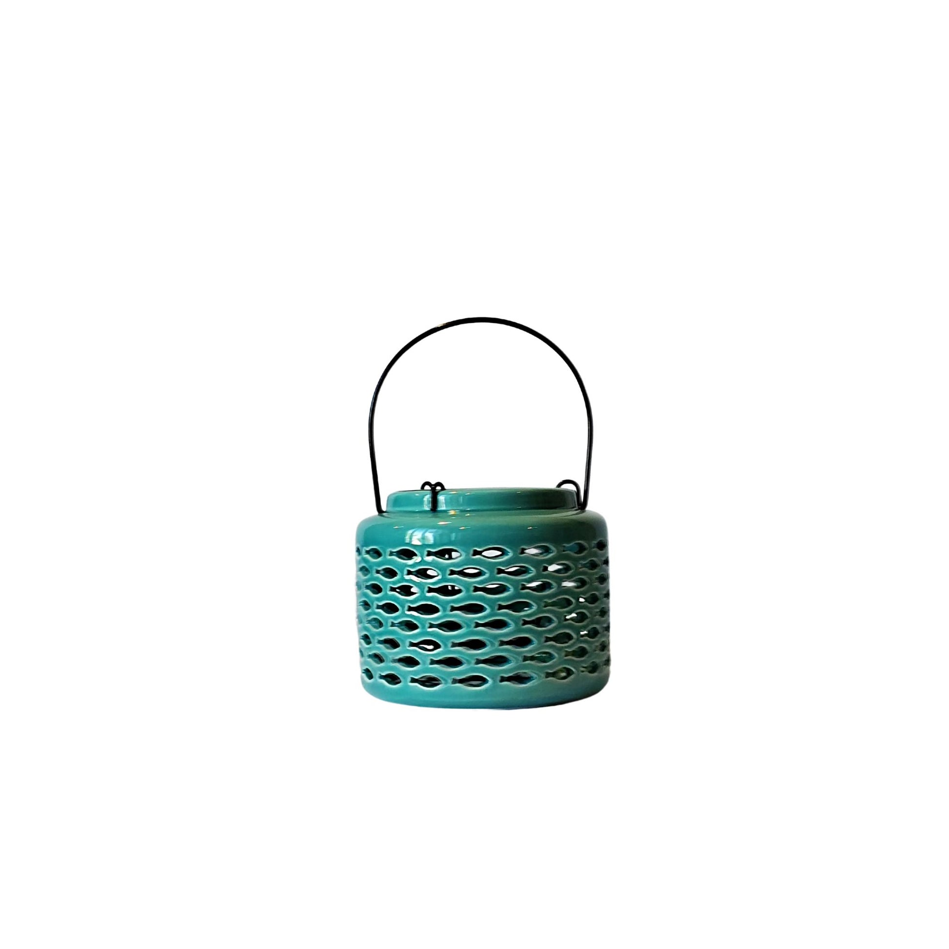 Aquamarine colored lantern, uniquely designed with nautical shaped cut outs that allow light from the candles to shine through.  Each lantern has a wire insert that holds the candle in the middle of the lantern and metal handle for hanging if desired.