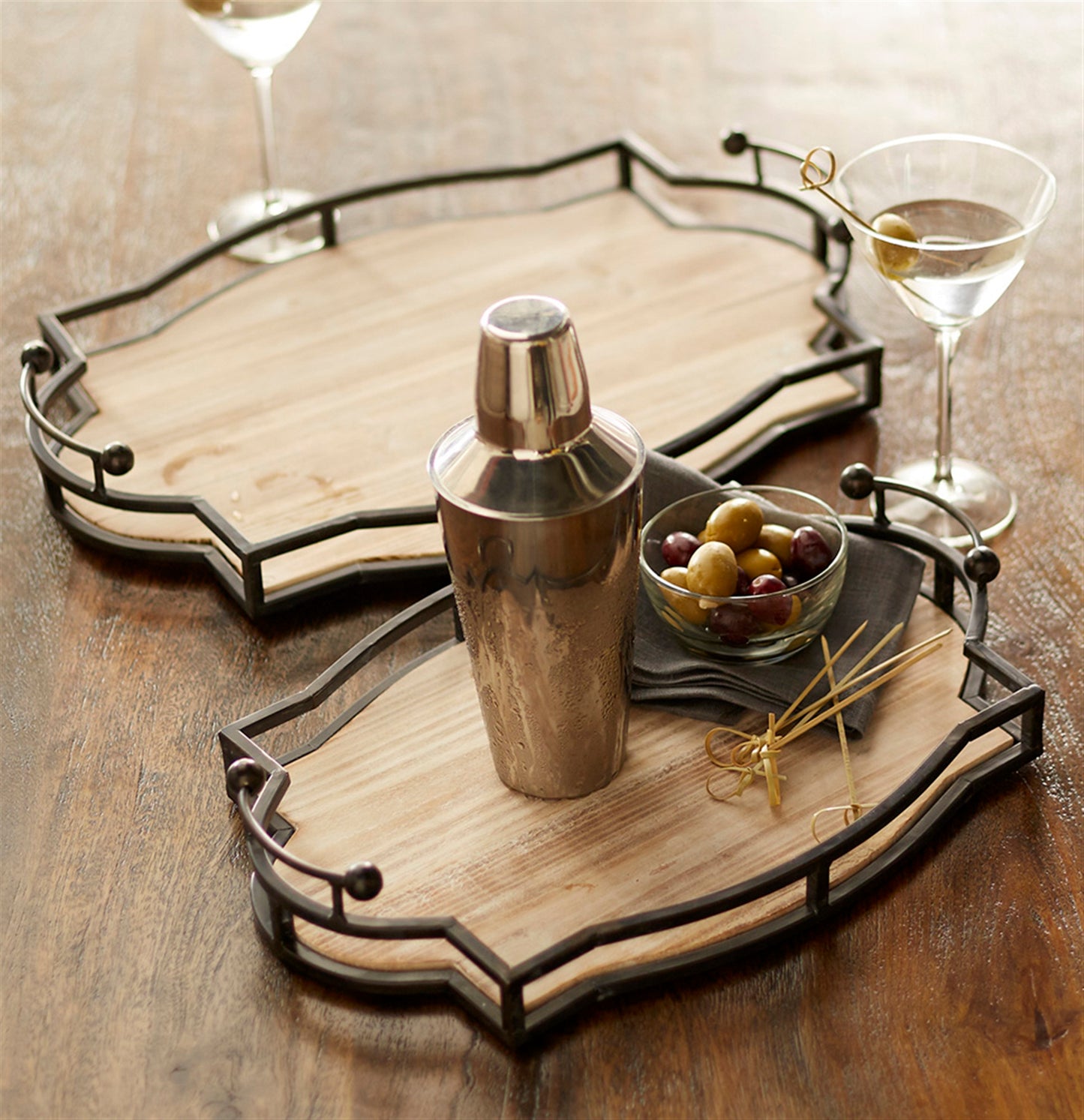 Decorative trays with  natural wooden composition paired with the traditional metal handle design